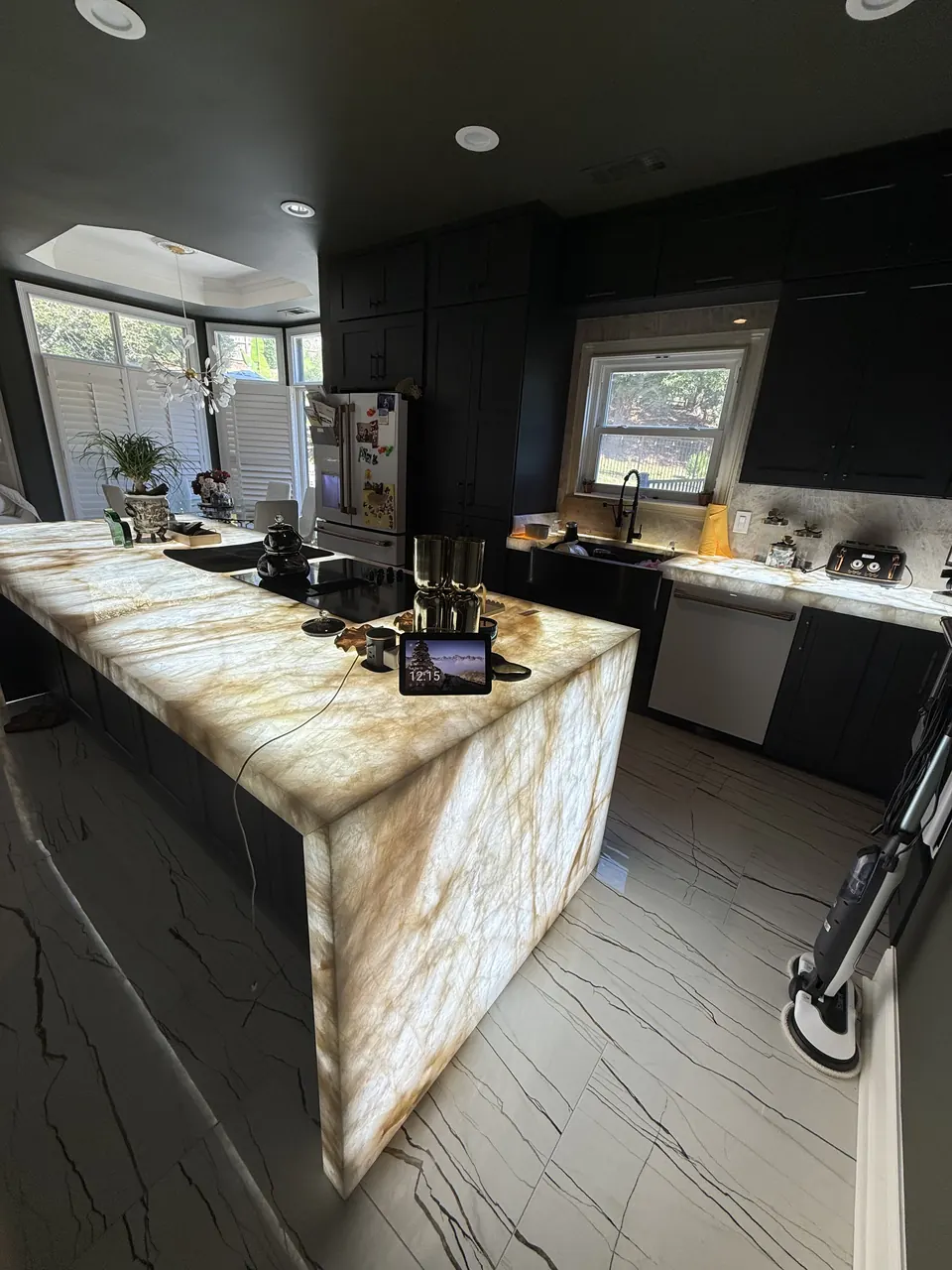 Backlit Stone & Dark Cabinetry — after view 2