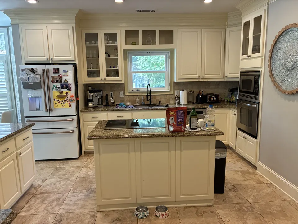 Backlit Stone & Dark Cabinetry — before view 4