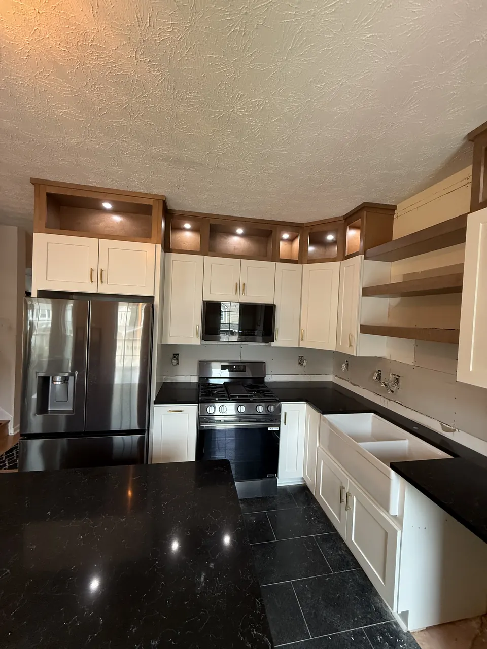 Two-Tone Cabinetry, Dark Surfaces — after view 1